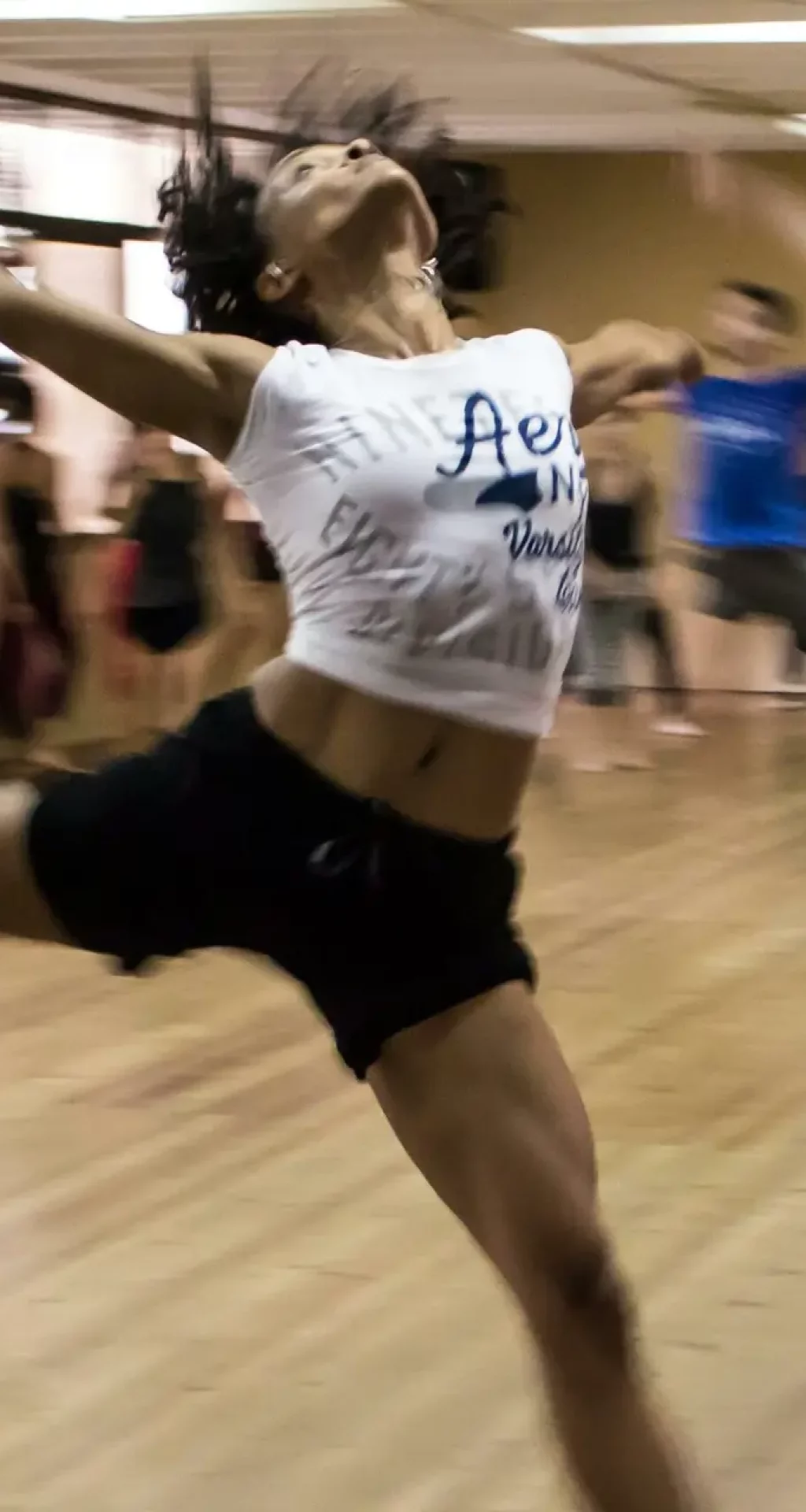 Dynamic group dance class showcasing diverse techniques and spirited expressions.